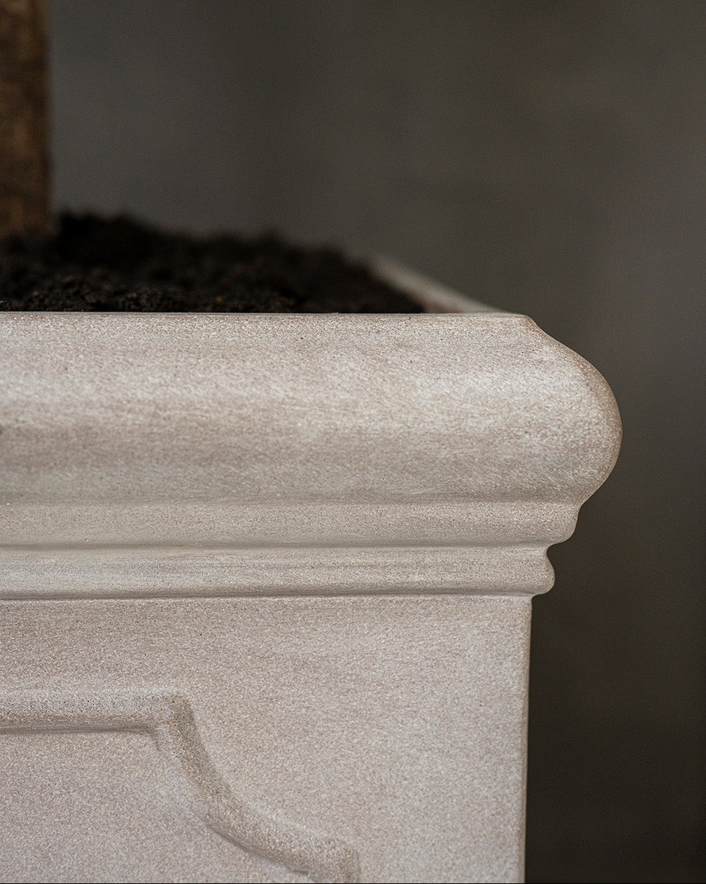 Close-up of a stone fireplace with a blurred background